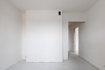 interior of the apartment without decoration in gray colors. rough finish