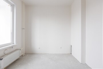 interior of the apartment without decoration in gray colors. rough finish