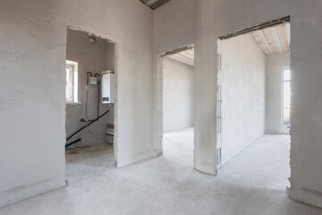 interior of the apartment without decoration in gray colors. rough finish