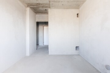 interior of the apartment without decoration in gray colors. rough finish