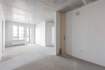 interior of the apartment without decoration in gray colors. rough finish