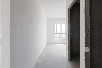 interior of the apartment without decoration in gray colors. rough finish