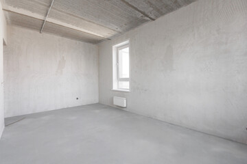 interior of the apartment without decoration in gray colors. rough finish