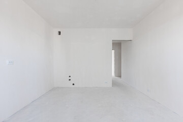 interior of the apartment without decoration in gray colors. rough finish