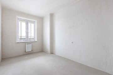 interior of the apartment without decoration in gray colors. rough finish