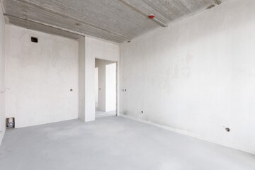 interior of the apartment without decoration in gray colors. rough finish