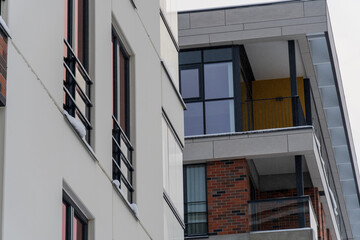 Looking up to modern new apartments building at Pille street during winter time. Tallinn, Estonia, Europe. December 2023