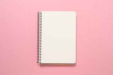 notebook on colored background