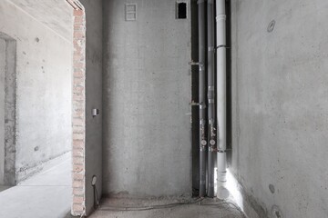 interior of the apartment without decoration in gray colors. rough finish