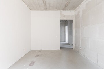 interior of the apartment without decoration in gray colors. rough finish