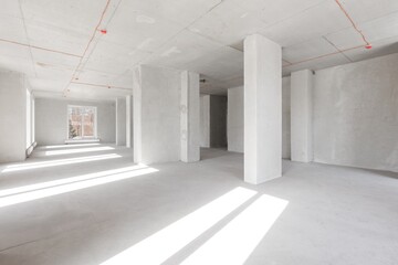 interior of the apartment without decoration in gray colors. rough finish