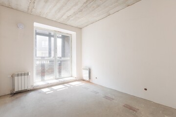 interior of the apartment without decoration in gray colors. rough finish