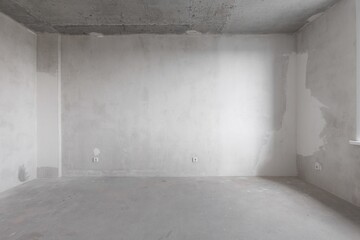 interior of the apartment without decoration in gray colors. rough finish