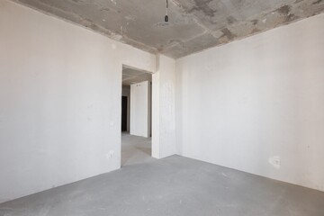 interior of the apartment without decoration in gray colors. rough finish