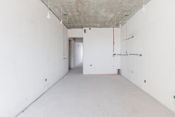 interior of the apartment without decoration in gray colors. rough finish