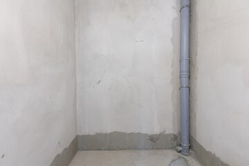 interior of the apartment without decoration in gray colors. rough finish