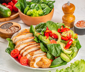 Grilled chicken breast, fillet salad with fresh vegetable. Ketogenic diet. Healthy food concept. top view