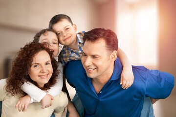 Fototapeta premium Mom, dad and small child have fun at home