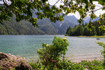Scenery of Lake Predil with scenic view of majestic mountain peaks of Julian Alps, Tarvisio, Friuli...