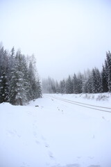 Fototapeta na wymiar Snowy road in Sudety mountains, Poland