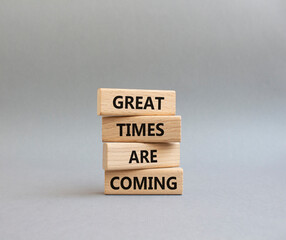 Great times are coming symbol. Concept words Great times are coming on wooden blocks. Beautiful grey background. Business and Great times are coming concept. Copy space.