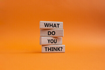 What do you think symbol. Wooden blocks with words What do you think. Beautiful orange background. Business and What do you think concept. Copy space.