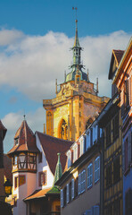 Traditional half-timbered houses on street in Colmar, Alsace region, France