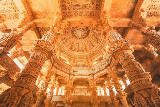 Bas-relief at columns at famous ancient Ranakpur Jain temple in Rajasthan state, India