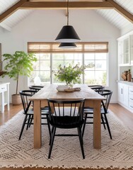 Black spindle back chairs with a wood table and white walls
