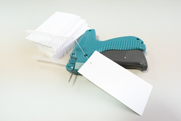 Marking gun. A working tool for attaching labels. Textile industry