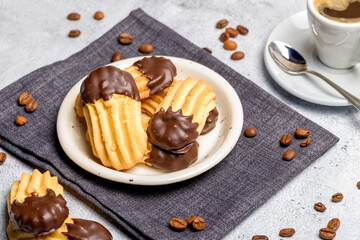 Chocolate shortbread cookies. Light background. Selective focus