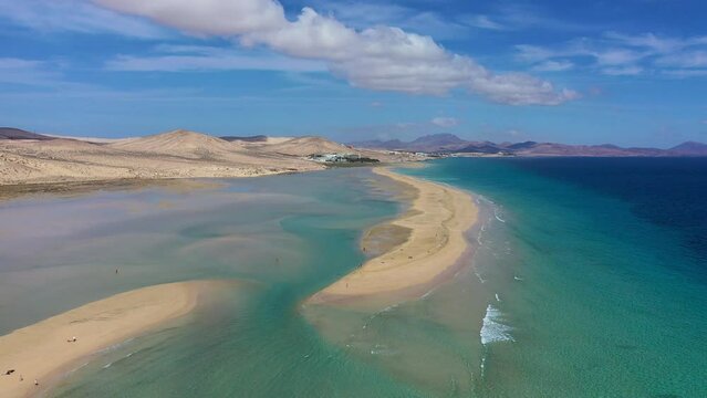 View on the beach Sotavento with golden sand and crystal sea water of amazing colors on Costa Calma on the Canary Island Fuerteventura, Spain. Beach Playa de Sotavento, Canary Island, Fuerteventura.