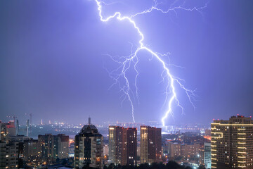 Lightning in the night sky over the city.