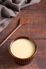 Fresh condensed milk in the bowl.