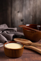 Fresh condensed milk in the bowl.