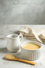 Fresh condensed milk in the bowl.