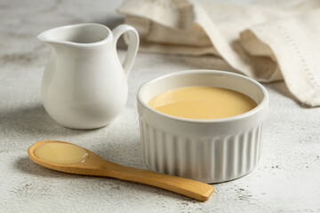 Fresh condensed milk in the bowl.