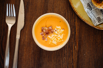 Salmorejo soup with bacon in bowl - 705235973