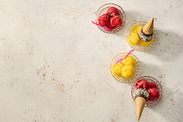Refreshin raspberry and mango sorbet in glass bowls top view