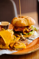 Delicious burger with fried potato - 705236512