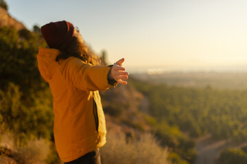 Hiker Enjoying Sunset from Mountain Trail - obrazy, fototapety, plakaty