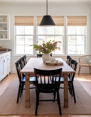 Obraz premium Black spindle chairs and table with pink flowers centerpiece