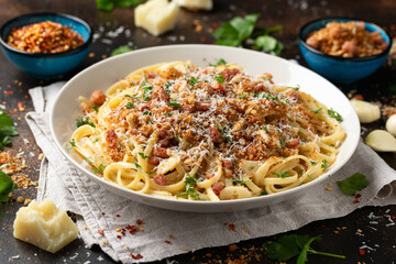 Spaghetti With Toasted Breadcrumbs, bacon and parmesan cheese.
