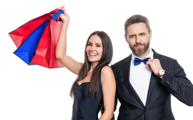 Couple holding shopping bags isolated white. Couple with shopper bags in mall. Consumerist duo. Purchasing present together. Two man and woman in shop mall. Big sale and shopping with couple