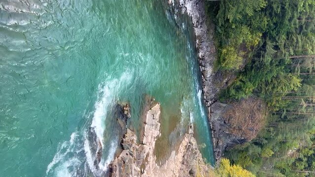 The Bolshaya Laba River. A mountain emerald river in a narrow, sunlit canyon. Bolshaya Laba River near the village of Psemen in Karachay-Cherkessia, Russia. Panoramic view. 4K