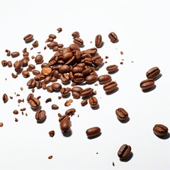 Coffee beans scattered on a white surface
