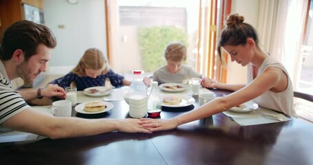 Breakfast, religious and family praying for food with gratitude for a meal in the morning in a home table. Children, parents and kids with spiritual mother and father pray to give thanks God - Powered by Adobe