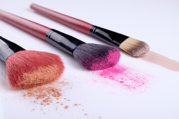 Brushes synthetic pile working powder make-up isolated on white background