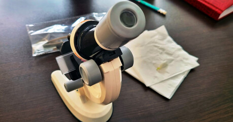 Shot of the microscope on the table. Science