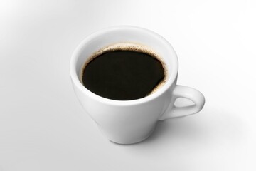 Cup of tasty hot espresso coffee on the desk